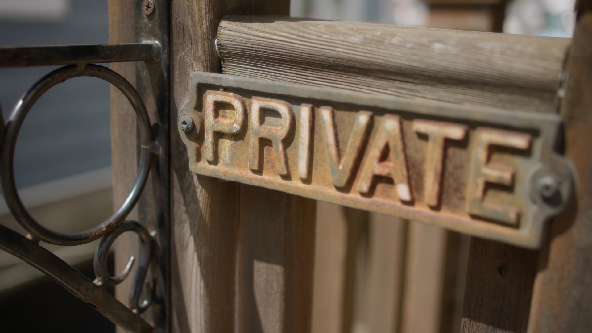 Private sign on wooden gate
